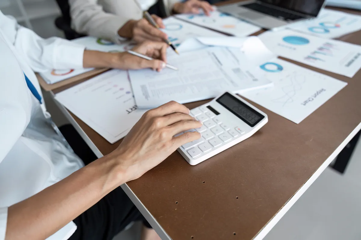 business-bookkeeper-working-with-calculator