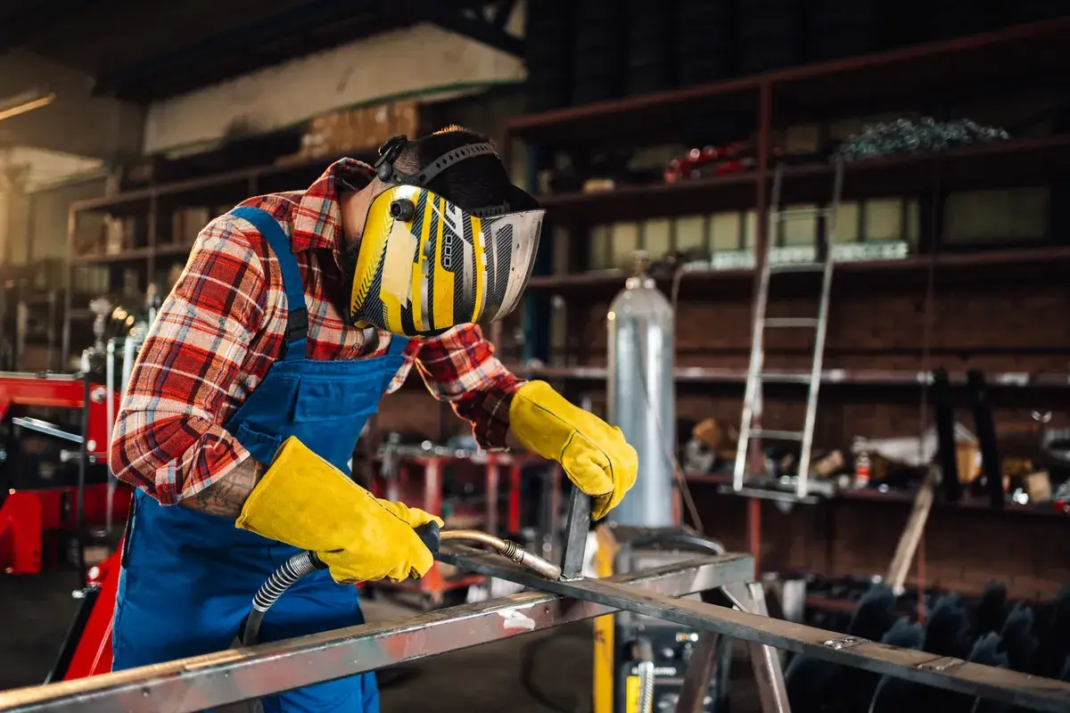 man-holding-a-metal-plate-upright
