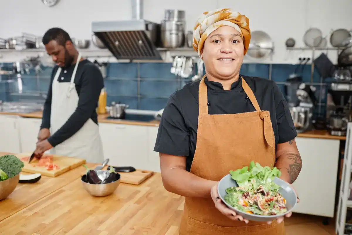 smiling-chef-in-cafe-kitchen
