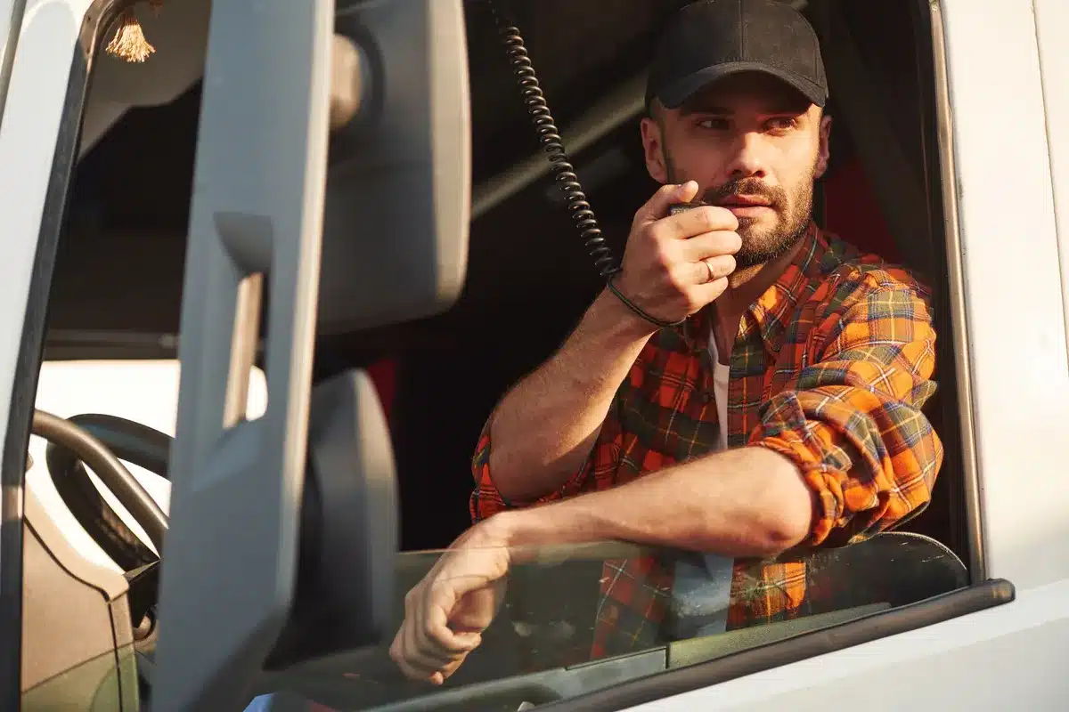 talking-by-using-radio-young-truck-driver